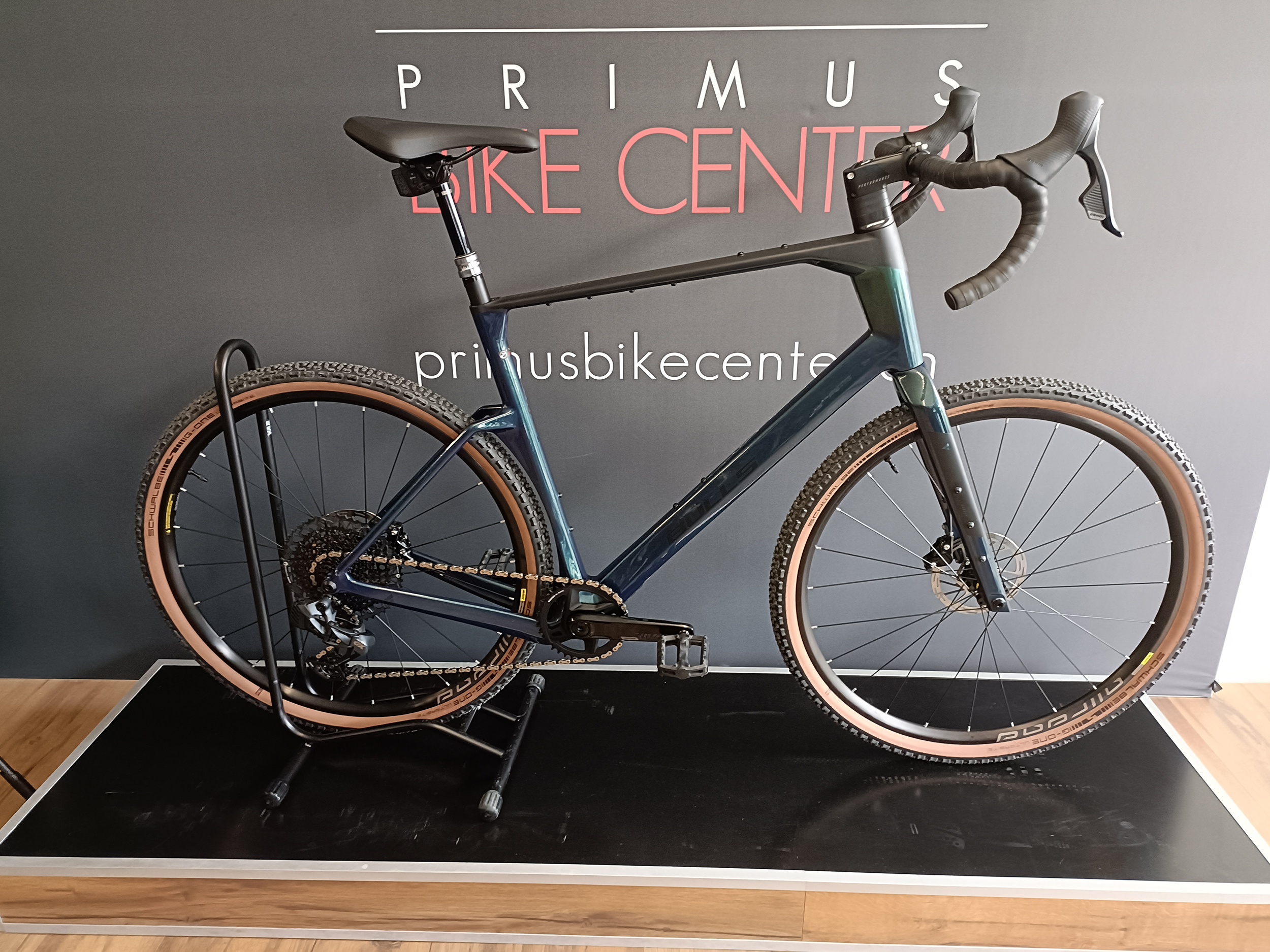 Gravel bike BULLS Trail Machete rainbow petrol /carbon | PRIMUS BIKE CENTER