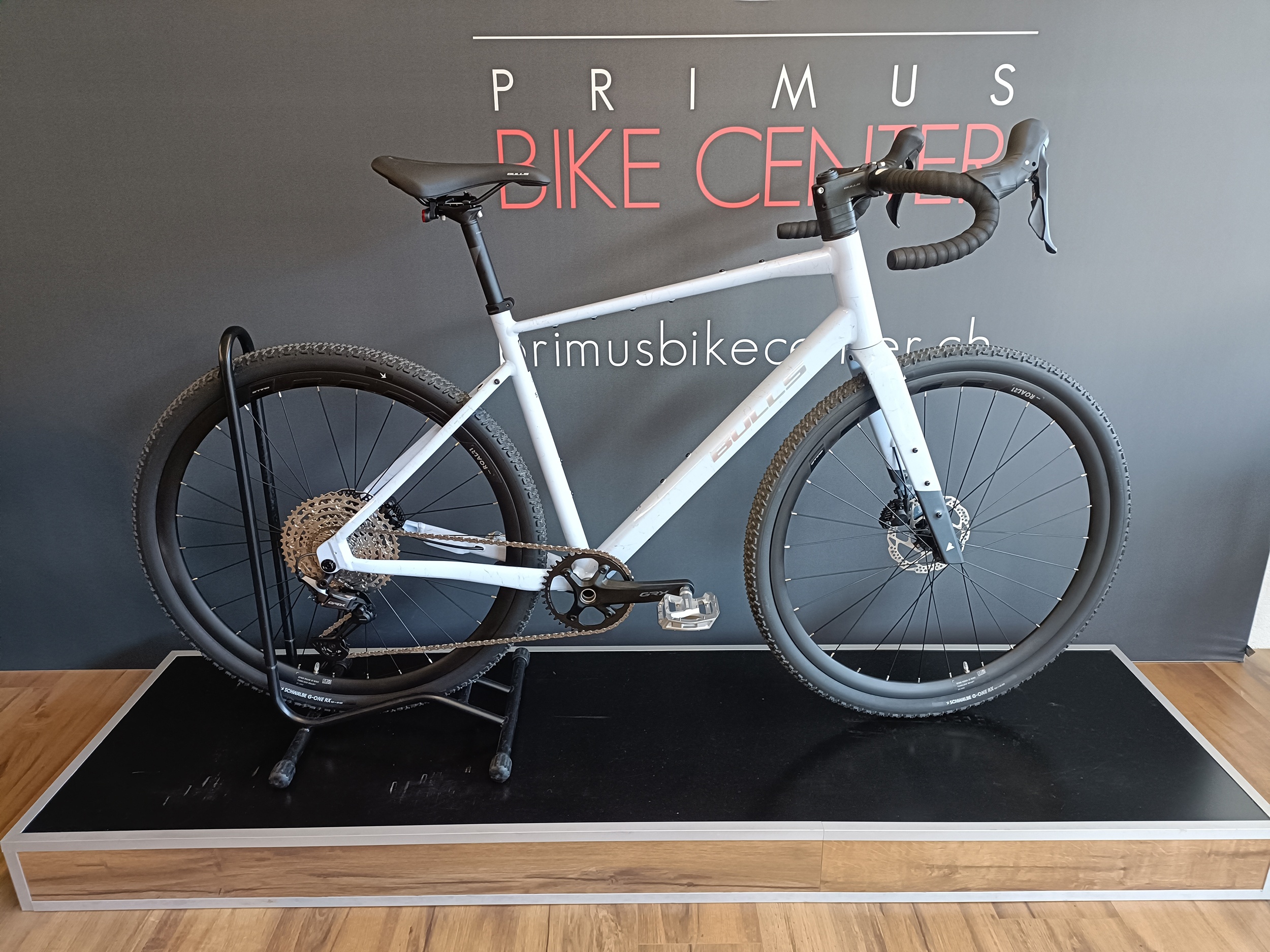 Gravel Bike BULLS Grinder 3 blue tinted white midnight rainbow 2027 | PRIMUS BIKE CENTER